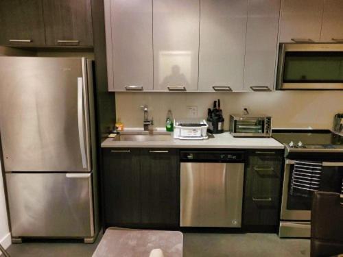 Furnished 1 Bedroom In East Village By Signature Suites Ltd Calgary Luaran gambar