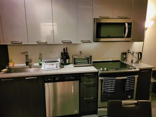 Furnished 1 Bedroom In East Village By Signature Suites Ltd Calgary Luaran gambar
